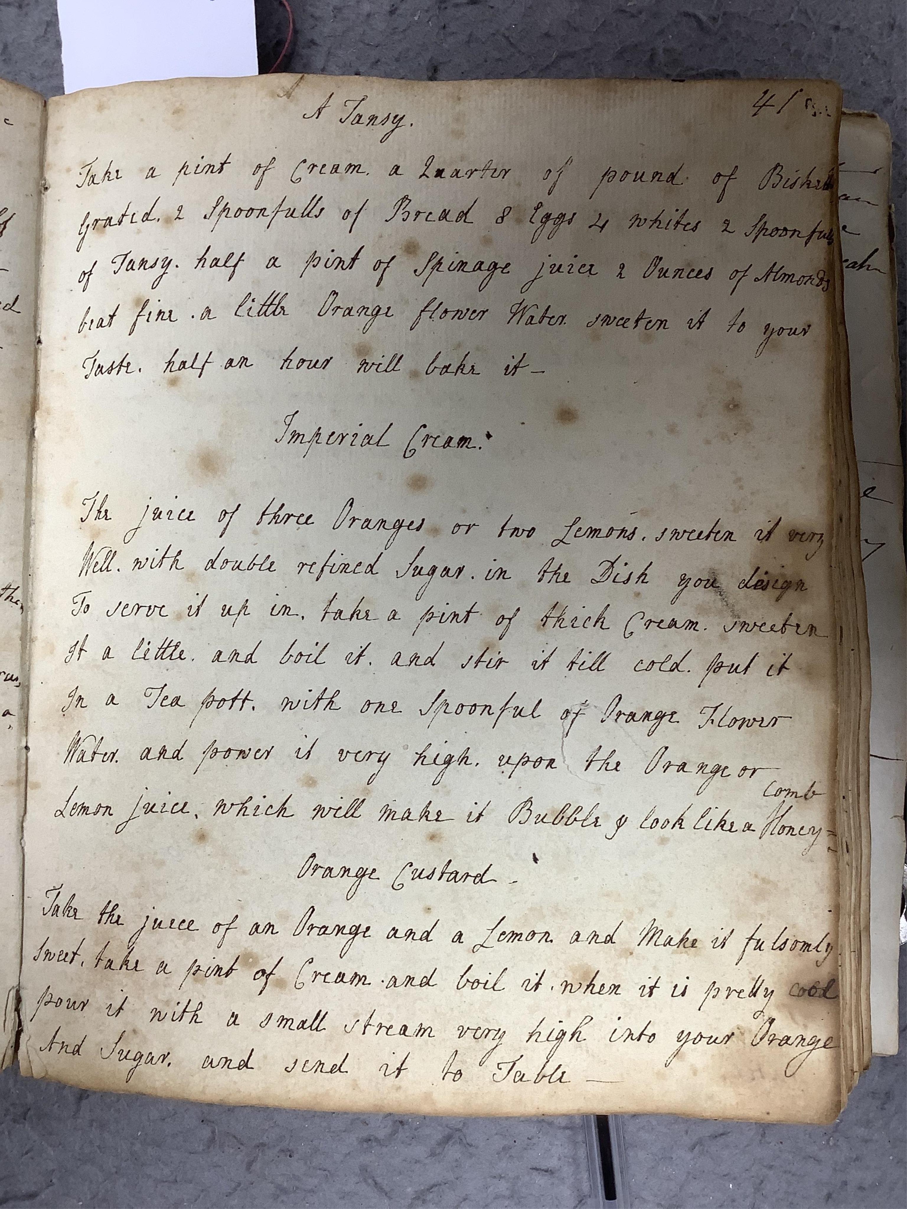 An 18th century hand inscribed book of recipes for M. Tennant. Condition - fair